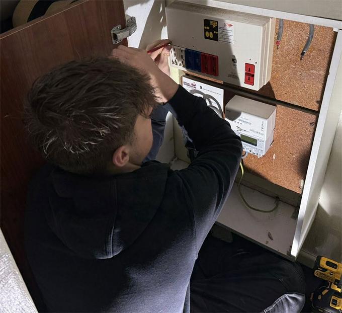 electrician in cupboard
